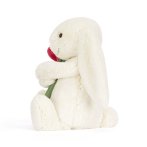 Kuscheltier Jellycat Hase Bashful Bunny mit einer roten Rose von der Seite