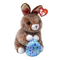 Ty Beanie Babies Hase Praline Rabbit ist aus braunem Plüsch und hält ein blaues Stoffei in den weißen Pfoten